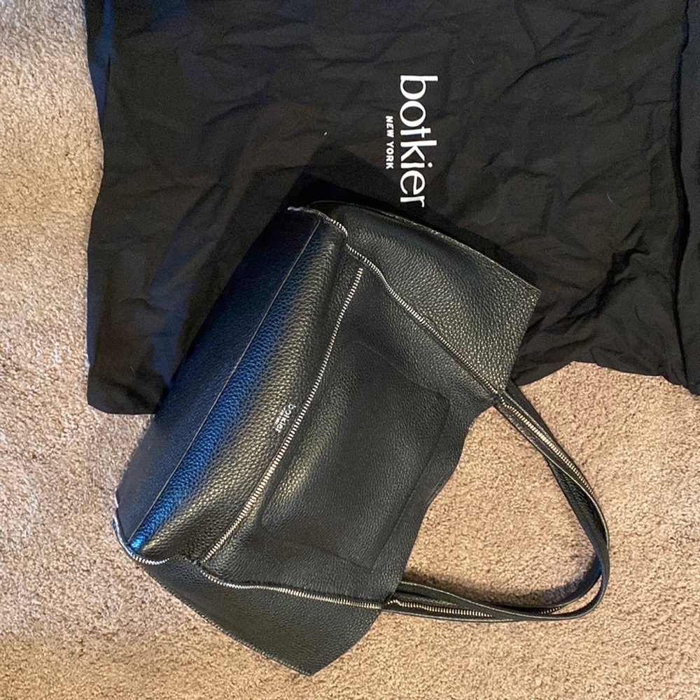 Botkier black medium size tote with silver zipper lining and silver inside